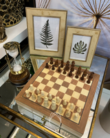 Um jogo de xadrez moderno com peças de metal. - Autodesk Community